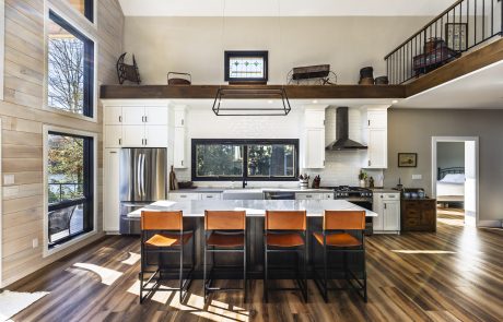 WHITE KITCHEN WITH ISLAND AND QUARTZ COUNTERTOPS